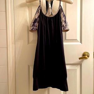 Lululemon 2 in 1 tank, size 12. Black with marbled attached bra.